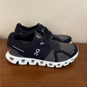 On Running Charcoal and White Athletic Shoes
